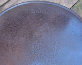 Sidney Arc Logo Cast Iron Skillet with Heat Smoke Ring by Wagner Ware
