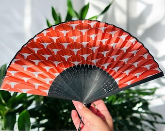 Ventilador de mano Texas Longhorn color naranja quemado, perfecto para climas cálidos #Hookem