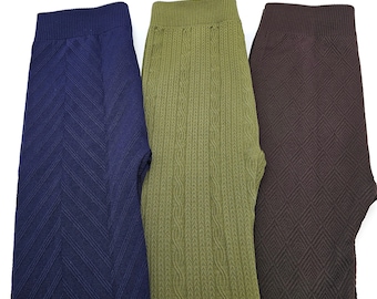 May include: Three pairs of leggings in different colors and patterns. One pair is navy blue with a chevron pattern, one is olive green with a cable knit pattern, and one is brown with a diamond pattern.