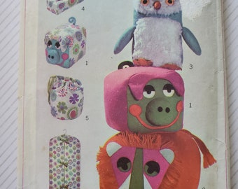 Simplicity 7928 Crafts Sewing Pattern, Groovy 1960s Pig, Lion, Owl Stuffed Animals Pillow Toys, Tissue Box Cover, Curler Bag, Garment Bag