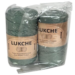 May include: Two spools of sage green 3 mm polypropylene macrame cord packaged together in clear plastic. Each spool features a tan paper label with the brand name LUKCHE printed in black text, along with the product description and a small icon.