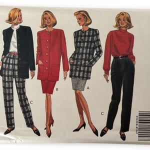 May include: Butterick Classics 6413 sewing pattern featuring five illustrated fashion ensembles. The designs include a red tunic and skirt, a black jacket with plaid pants, a red coat and skirt, a plaid jacket and skirt, and a red blouse with black pants.