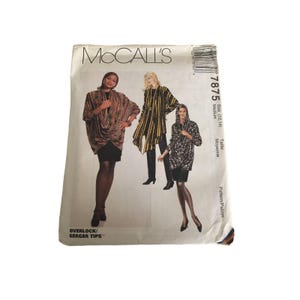 May include: A vintage McCall's sewing pattern envelope featuring three women modeling different draped garments. The envelope is white with the McCall's logo and pattern number 7875. The text "OVERLOCK/SERGER TIPS" is also visible.