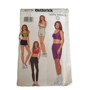 May include: A sewing pattern for a women's workout outfit. The pattern includes a sports bra, shorts, leggings, and a skirt. The pattern is by Butterick and is for sizes 12-14-16.