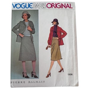 May include: A Vogue Paris Original sewing pattern envelope, number 1306, featuring a Pierre Balmain design. The cover displays a photograph and an illustration of a jacket and skirt ensemble, with a hat and dark shoes, on a white background.