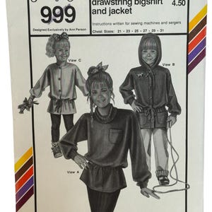 May include: Vintage sewing pattern for children's drawstring bigshirt and jacket, design 999. The pattern features illustrations of the garments and chest sizes from 21 to 31 inches. Includes the "Stretch & Sew" logo and a suggested retail price.