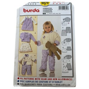 Op de afbeelding: Burda naaipatroon nummer 9829 voor een kinderoutfit. Het patroon bevat een jas, een broek, een rok en een jurk. Het patroon is voor de maten 74-98 cm (3 maanden tot 3 jaar).