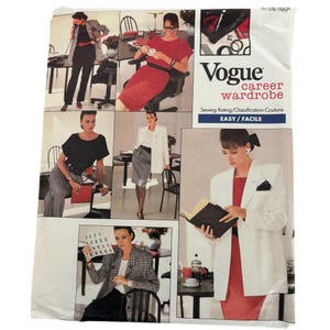 May include: A vintage Vogue sewing pattern titled "career wardrobe." The pattern features images of women in professional attire, including blazers, skirts, and dresses. The cover is white with the Vogue logo and the text "EASY / FACILE."