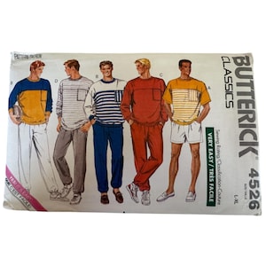 May include: A Butterick Classics 4526 sewing pattern envelope for casual loungewear. The illustration displays five variations of shirts and pants, including color-blocked, striped, and solid designs with chest pockets. Size range L-XL.