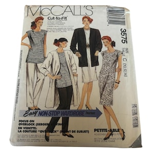 May include: McCall's sewing pattern number 3575, size C (10, 12, 14), for a non-stop wardrobe. The pattern includes four different styles: a striped top with cap sleeves, a striped top with long sleeves and a cardigan, a white dress with a black cardigan, and a black and white patterned dress. The pattern is labeled "Easy Non-Stop Wardrobe" and "Petite-Able".