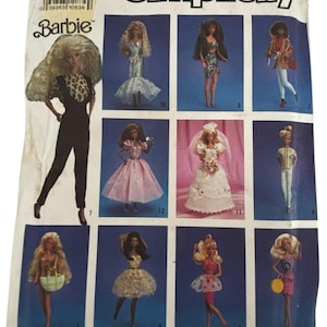 May include: A vintage Simplicity Barbie pattern featuring various doll outfits. The pattern includes images of Barbie dolls in different dresses and outfits. The pattern is labeled "7046" and "ONE SIZE".