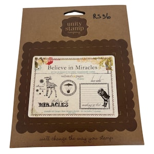 May include: A brown cardstock stamp set from Unity Stamp Company. The set includes pre-cut, red rubber stamps with the words "Believe in Miracles" and other designs. The package also includes the text "we'll change the way you stamp."