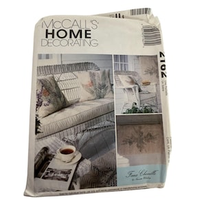 May include: A McCall's Home Decorating pattern packet showing a wicker sofa with patterned cushions. The packet includes the text "Faux Chenille" and the number "7012".
