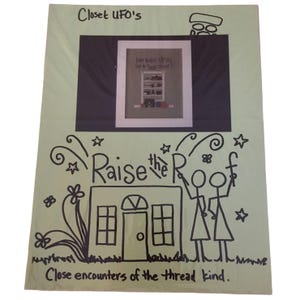 May include: A light green poster with the text "Closet UFO's" and "Raise the Roof". The poster has a framed image of a closet. The phrase "Close encounters of the thread kind" is also written on the poster.