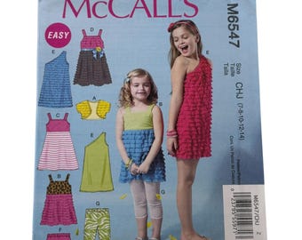 McCalls Sewing Pattern M6547 Shrug Top Shorts Leggings Easy Girls 7-14 Uncut Ruffle Outfit