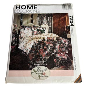 May include: A vintage sewing pattern for a floral bedding set. The pattern is for a duvet cover, pillowcases, and a decorative pillow. The pattern is by Croscill Home Fashion and is labeled 7224.