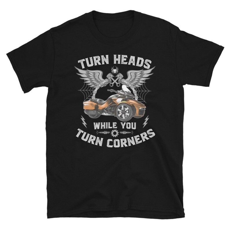 May include: Black t-shirt with a graphic of a motorcycle and the text "Turn Heads While You Turn Corners".