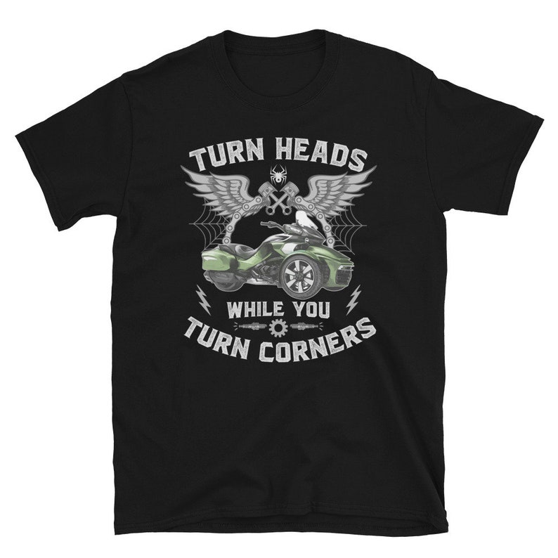 May include: Black t-shirt with a white graphic of a green motorcycle with the text "Turn Heads While You Turn Corners".