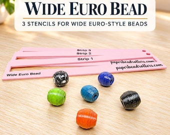 May include: Three pink plastic stencils labeled Wide Euro Bead, Strip 1, Strip 2, and Strip 3, with the text paperbeadrollers.com. Six barrel-shaped paper beads in black, lime green, blue, and orange are arranged in front of the stencils.