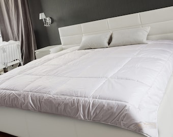 Bettdecke aus Merinowolle - mittleres Gewicht 500g Qualitätsprodukt mit Baumwollbezug. Die ganze Saison