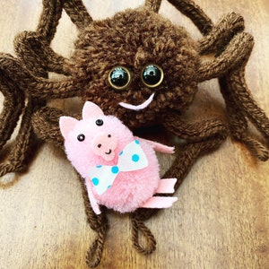Charlotte’s Webb Spider Knitted Pom Pom Cutey Crawly Plush with Little Pig Decorations