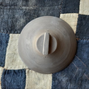 Cloche em barro negro