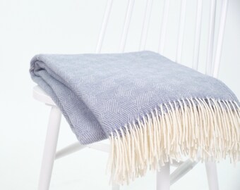 Boho living room dusty light blue 100% NZ wool throw blanket with fringes and textured pattern