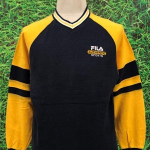 Yellow fila jumper hotsell