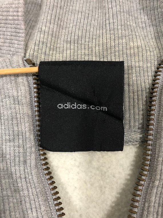 Adidas skateboarding top spell out