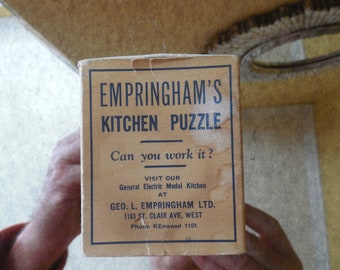 Puzzle de cuisine publicitaire vintage pour appareils électroménagers pour la General Electric Company, George L Empringham LTD.