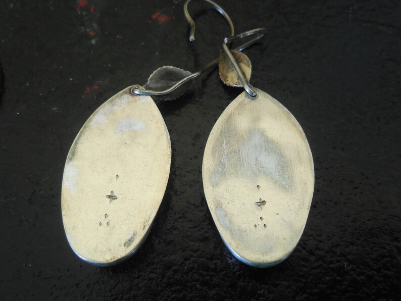 Authentic Southwestern Native American Navajo Signed with dots and a cross hammered Silver with green glass stone earrings
