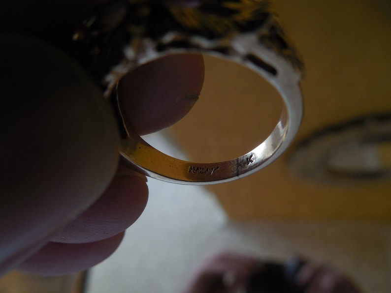 5 grams. size 5 12 Beautiful 14 k gold and amethyst ring