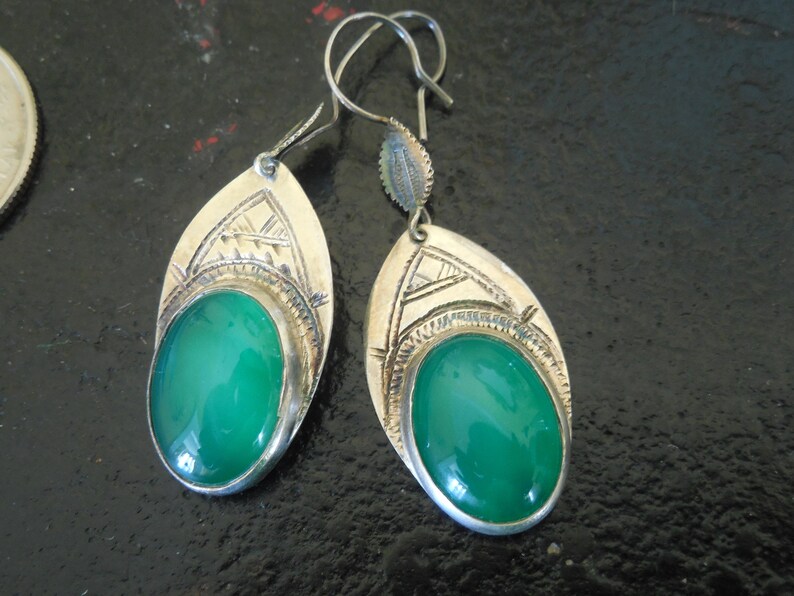 Authentic Southwestern Native American Navajo Signed with dots and a cross hammered Silver with green glass stone earrings