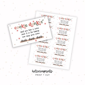 May include: A sheet of printable rectangular tags featuring the text cookie dunker in red and green, followed by the instructions: First you take a cookie, dunk it in the topping, now enjoy your cookie, and the repeated phrase dunk dunk dunk.