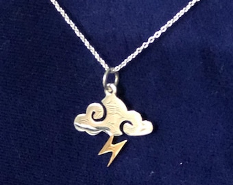Sterling Silver Cloud Charm with a Bronze Lightning Bolt will charge you up!