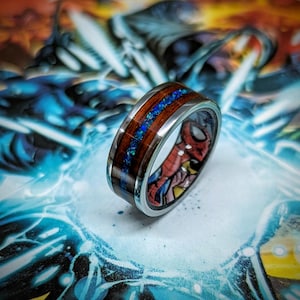 Brushed Titanium & Padauk wood Ring with Blue Opal inlay and Spider-Man Comic Book Secret Identity Liner
