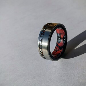 Brushed Titanium & Ebony wood Ring with Meteorite, Obsidian and Red Opal inlay and Deadpool Comic Book Secret Identity Liner Bentwood image 2