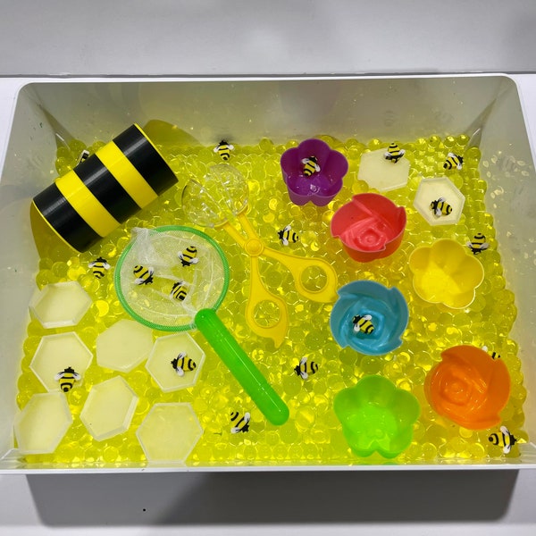 Sensory bin. Kids. Toys. Learning. Exploring. Toddlers. Preschool. Sensory play. Screen free play. Bees . Bumble bees .Bees knees.