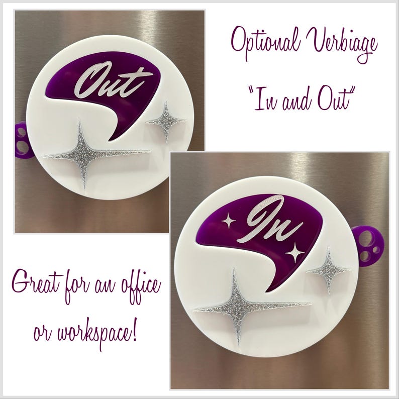 May include: Two white round magnetic signs with a purple, abstract, boomerang-shaped design. One sign says "Out" and the other says "In". Both signs have silver glitter stars.