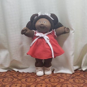 Black cabbage patch doll 1984 value cheap