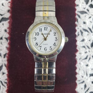 Montre à quartz vintage pour femme Watch-It en très bon état, fonctionne, pile neuve, ton argent/or, livraison incluse