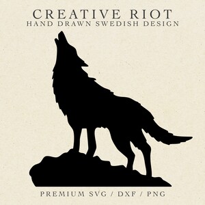 May include: Black silhouette of a wolf howling at the moon, standing on a rock. The image is titled "Creative Riot Hand Drawn Swedish Design" and "Premium SVG/DXF/PNG".