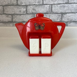 Vintage Retro Salt & Pepper shakers, Red, teapot teakettle shape holder to hang on wall, plastic, butterfly decal, Superlon, Chicago IL