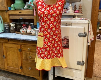 C. Women’s lady's apron, with ruffle and pocket, vintage or retro style, full length, red & yellow floral, gingham, thirties, forties style