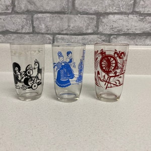Vintage Swanky Swigs juice glasses, sold individually , toys, bustling Betsy, spinning wheel, kraft