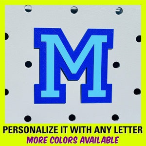 May include: Blue and light blue felt letter M.  PERSONALIZE IT WITH ANY LETTER. MORE COLORS AVAILABLE.