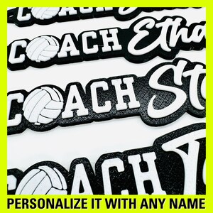 May include: Black and white volleyball coach name plaque with a volleyball graphic. The text reads "COACH" followed by a name.  Personalize it with any name.