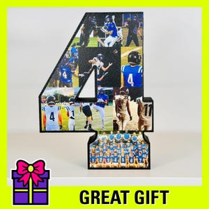 May include: Black wooden number four with a collage of photos of football players wearing blue and white uniforms. The photos are arranged in a grid pattern and include a team photo at the bottom. The number is a great gift for a football fan.