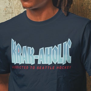 Release The Kraken! Funny T-Shirt Seattle Kraken Pirate Shirts T Shirt  Unisex Jersey Short Sleeve Tee Hoodie - AnniversaryTrending