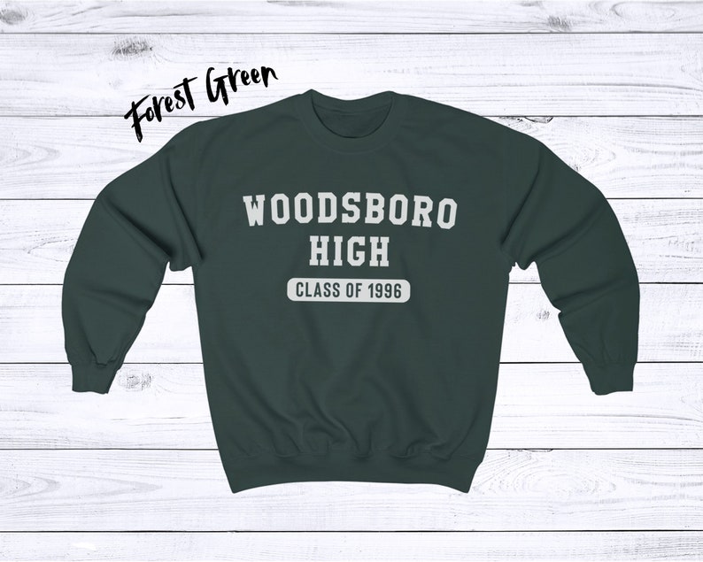 May include: Forest green sweatshirt with white text that reads "Woodsboro High Class of 1996".